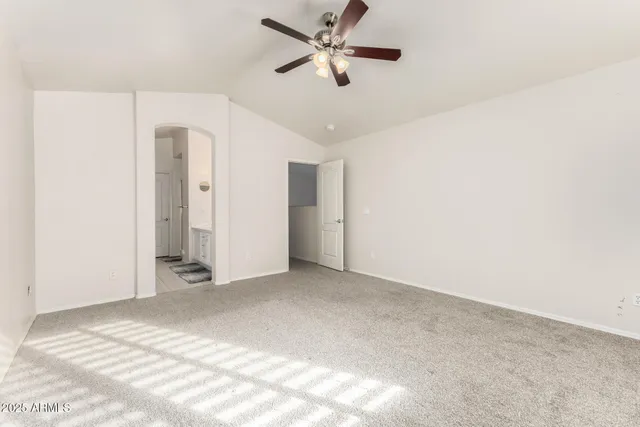a view of a big room with carpet