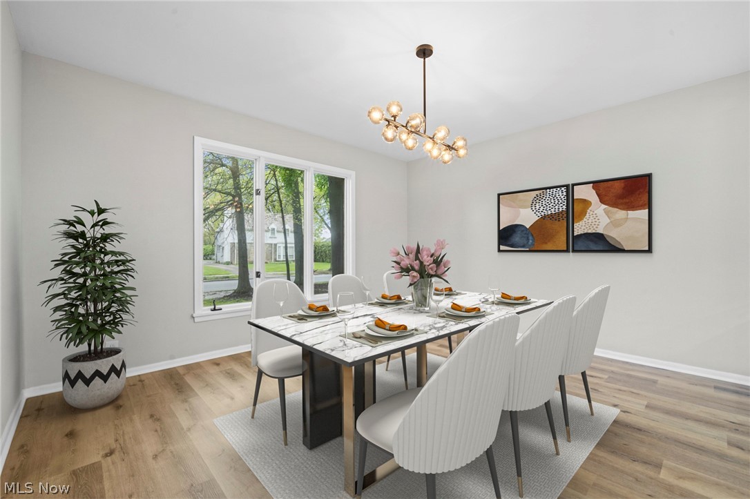 2375 Glendon Road University Heights, OH 44118 - Photo 9 of 50 Hardwood-finish flooring complements light wall tones in this dining area
