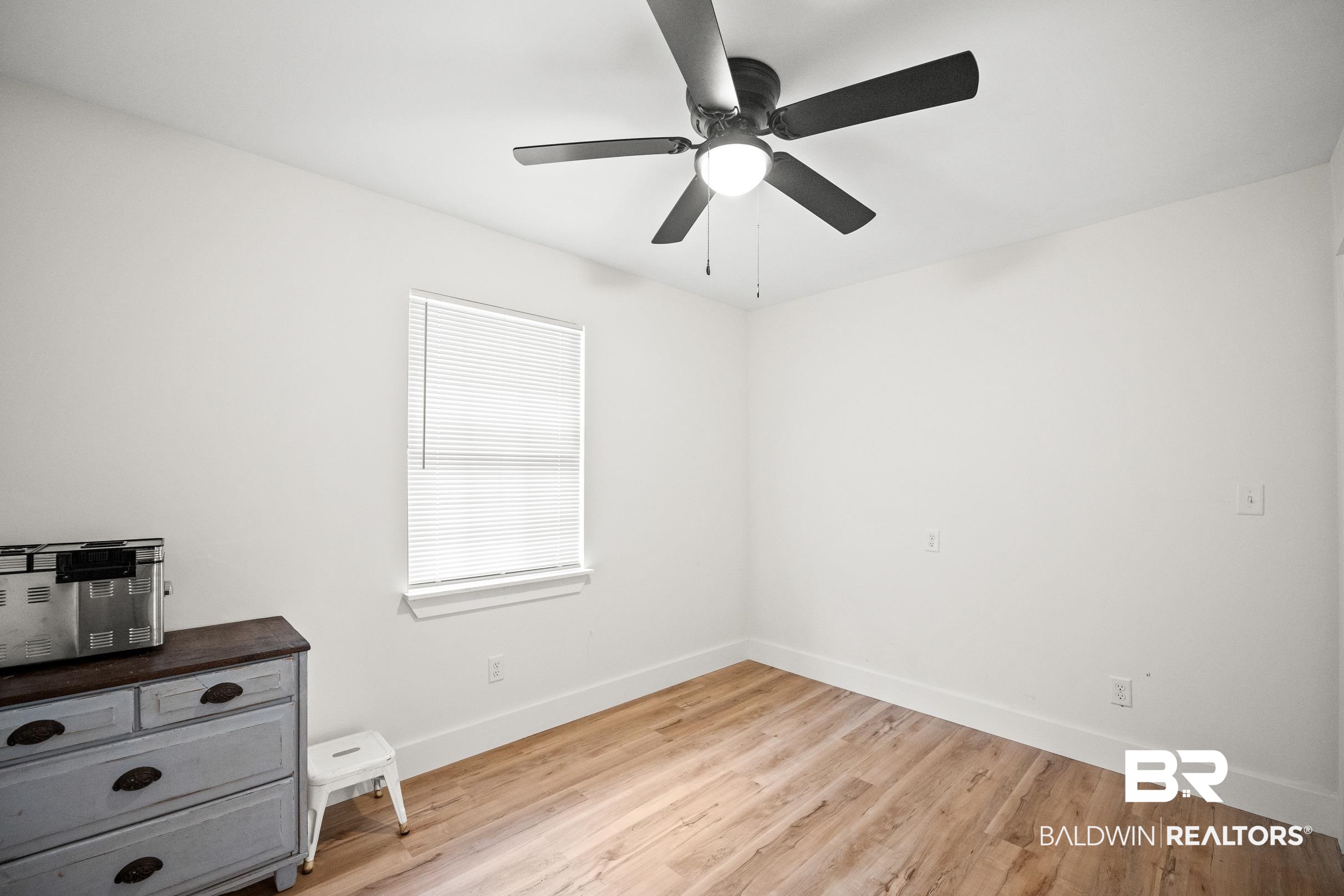 6 Wren Circle Foley, AL 36535 - Photo 27 of 55 Interior space with a ceiling fan, baseboards, and light wood finished floors