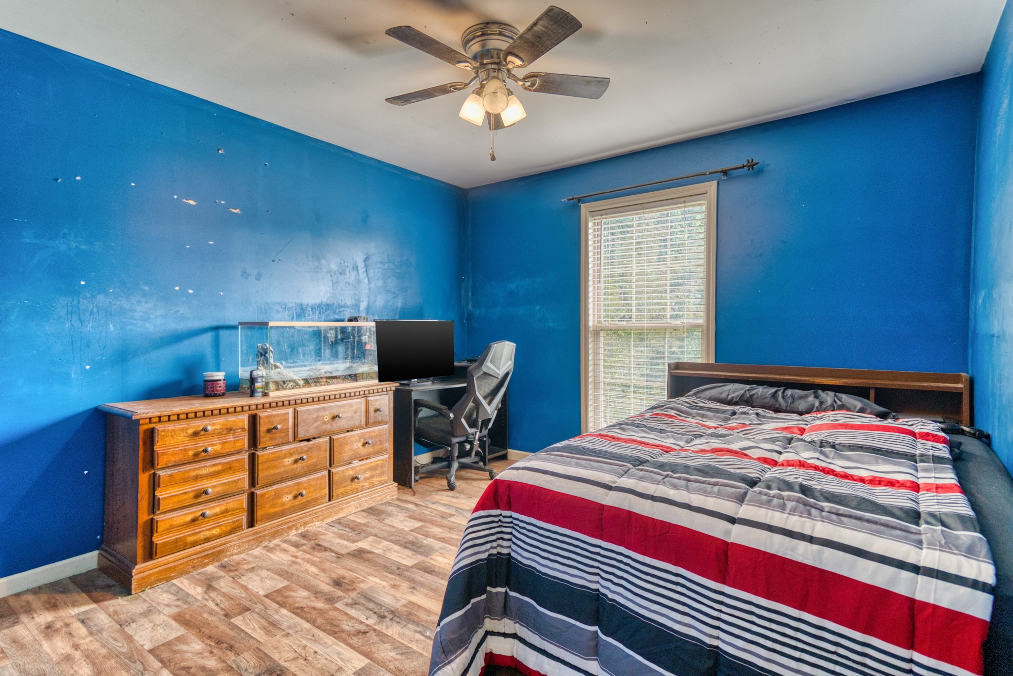 190 Rose Street Greenbrier, TN 37073 - Photo 14 of 32 a bedroom with a bed and a chandelier