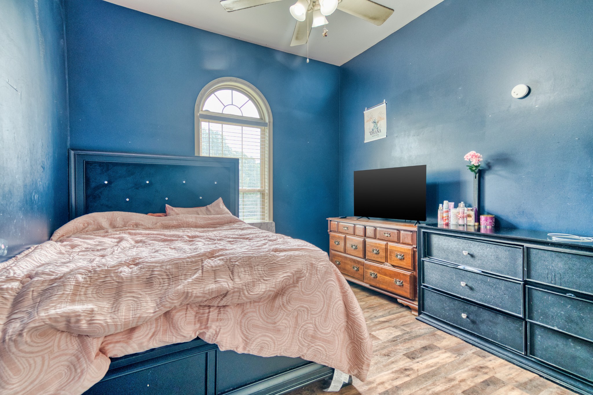 190 Rose Street Greenbrier, TN 37073 - Photo 16 of 32 a bedroom with a bed and a flat screen tv