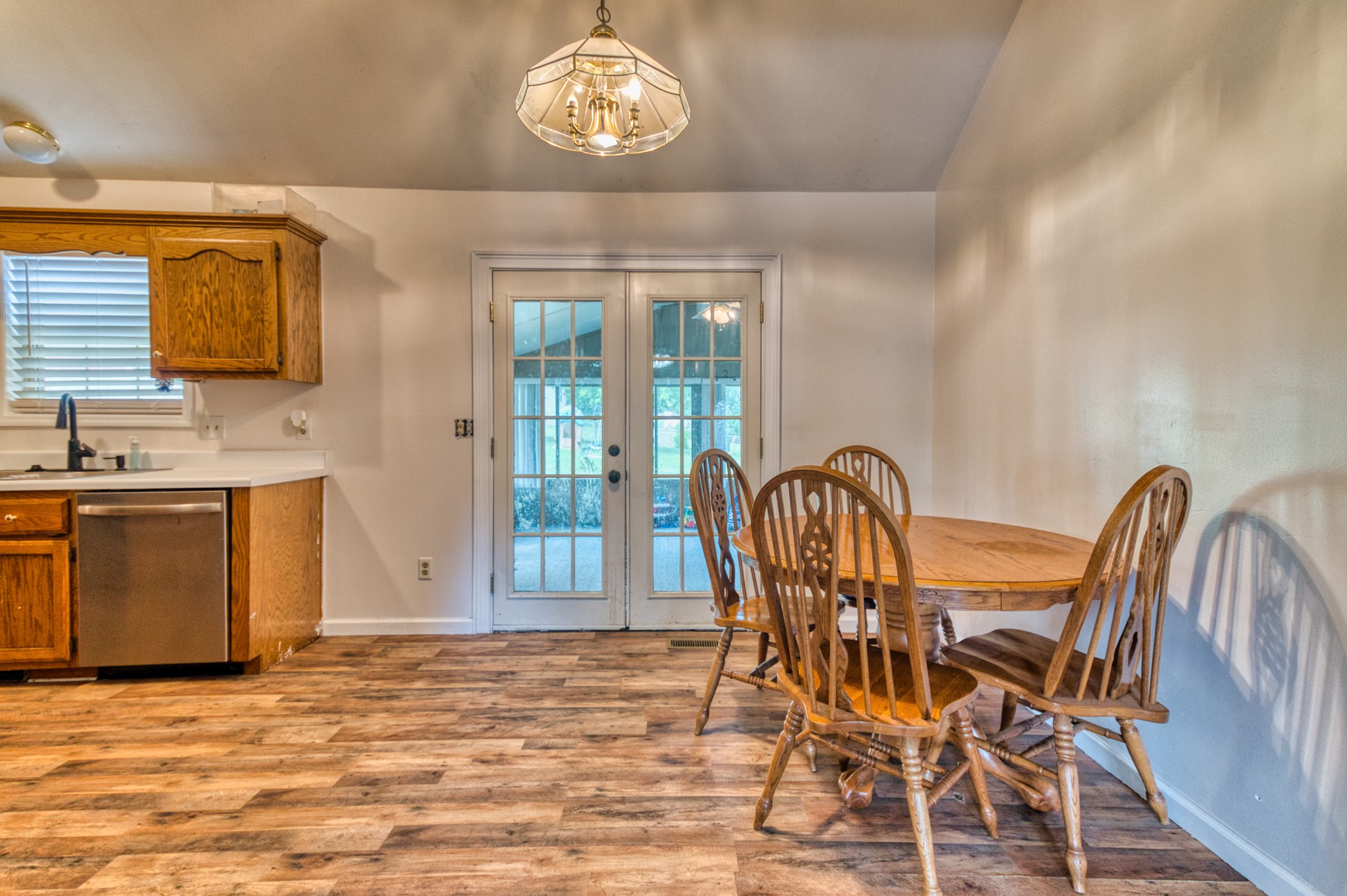 190 Rose Street Greenbrier, TN 37073 - Photo 19 of 32 a view of a dining room with furniture and a chandelier