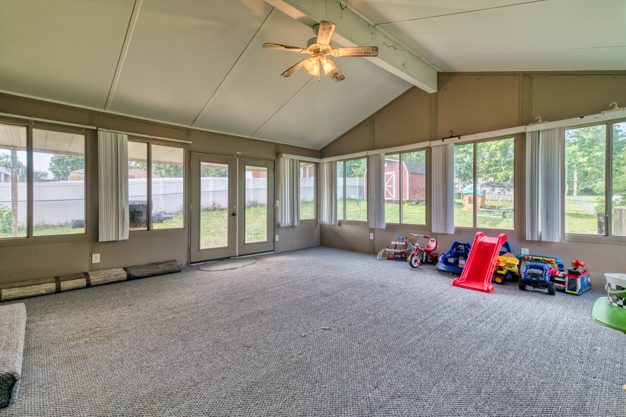 190 Rose Street Greenbrier, TN 37073 - Photo 25 of 32 a living room with furniture and large windows