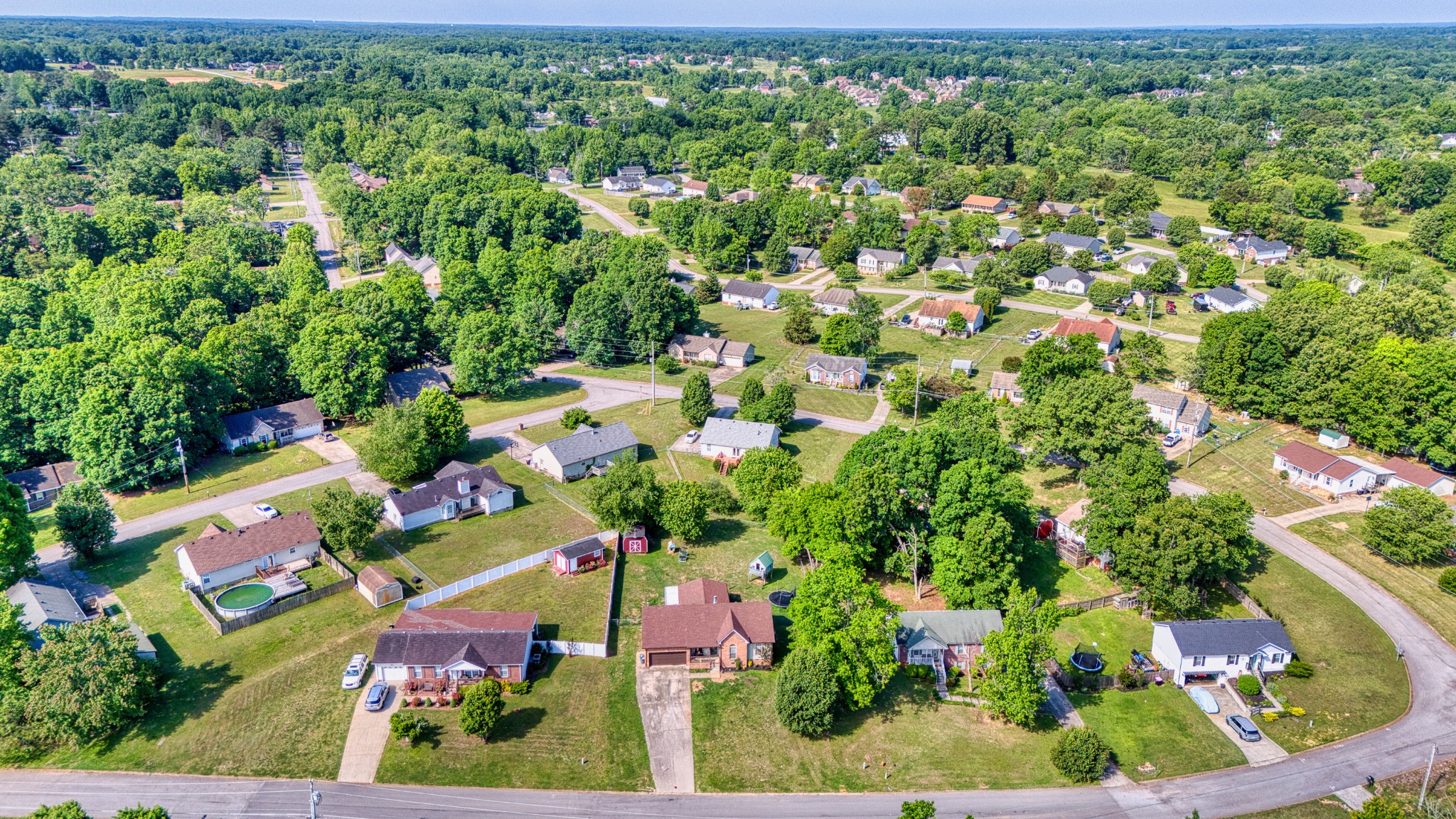 190 Rose Street Greenbrier, TN 37073 - Photo 31 of 32 an aerial view of residential house with outdoor space and trees all around