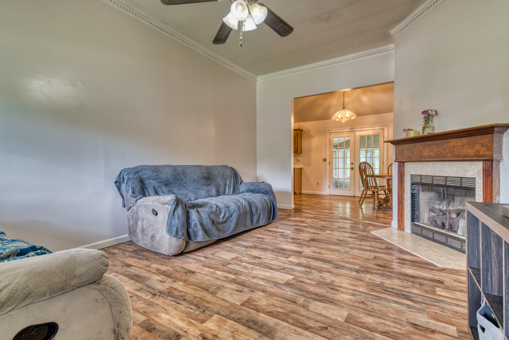190 Rose Street Greenbrier, TN 37073 - Photo 5 of 32 a spacious bedroom with a bed and a fireplace