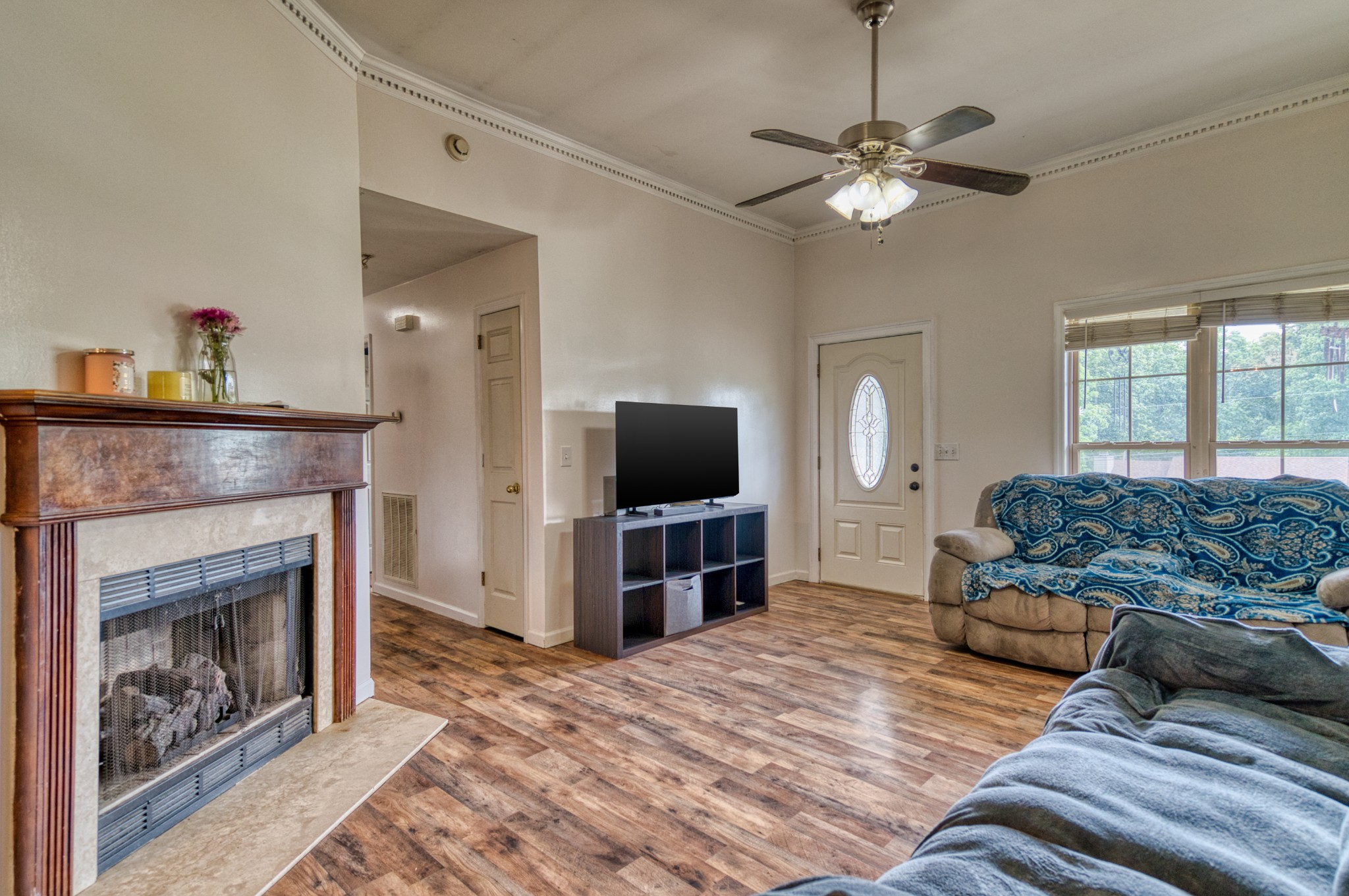 190 Rose Street Greenbrier, TN 37073 - Photo 6 of 32 a living room with furniture and a fireplace