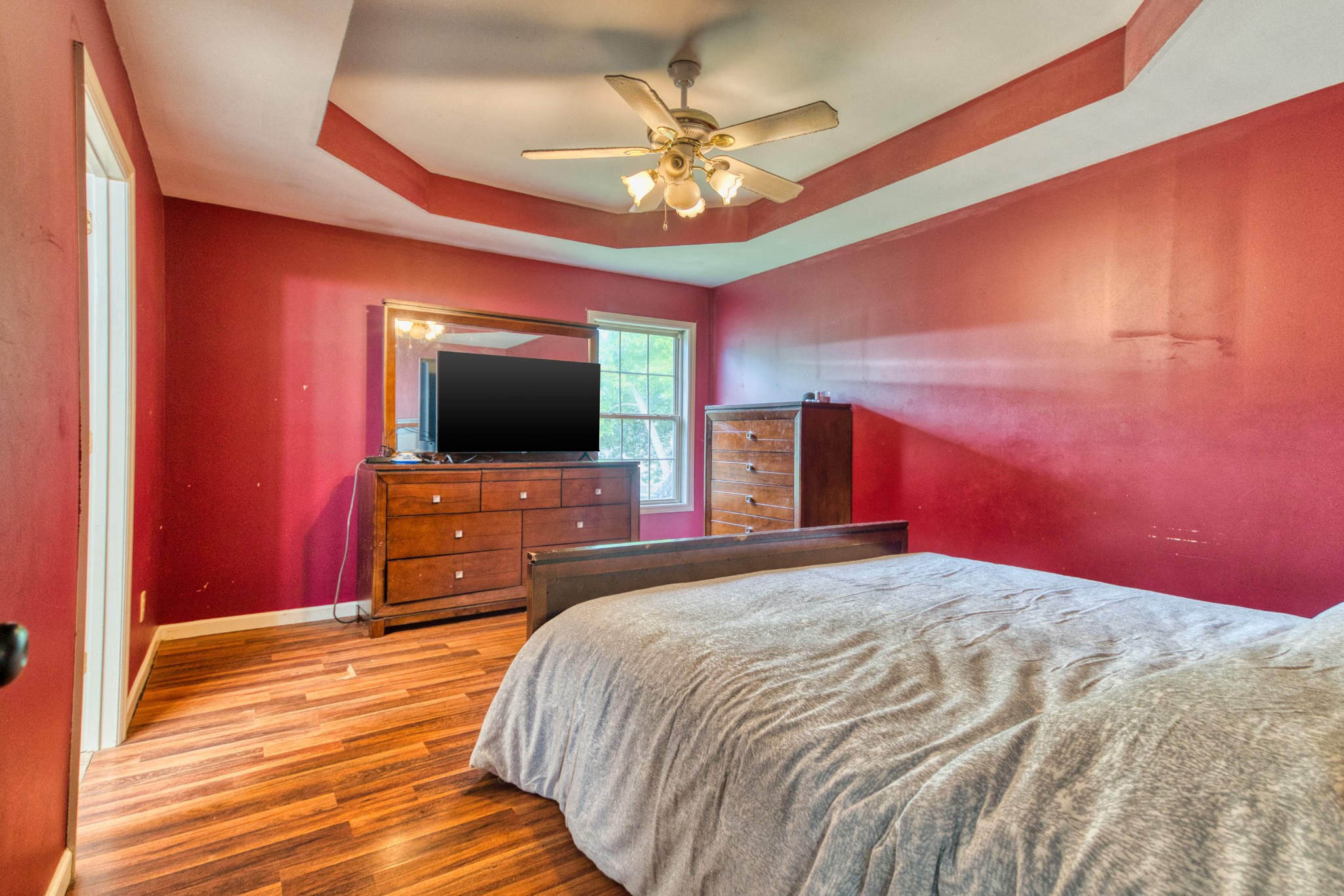 190 Rose Street Greenbrier, TN 37073 - Photo 9 of 32 a bedroom with a bed and a flat screen tv