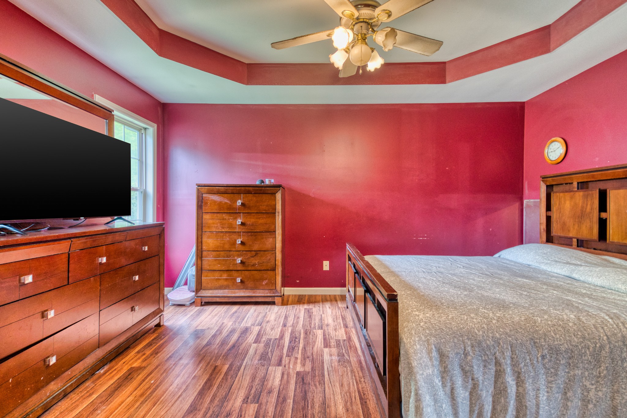 190 Rose Street Greenbrier, TN 37073 - Photo 10 of 32 a bedroom with a bed and a flat screen tv