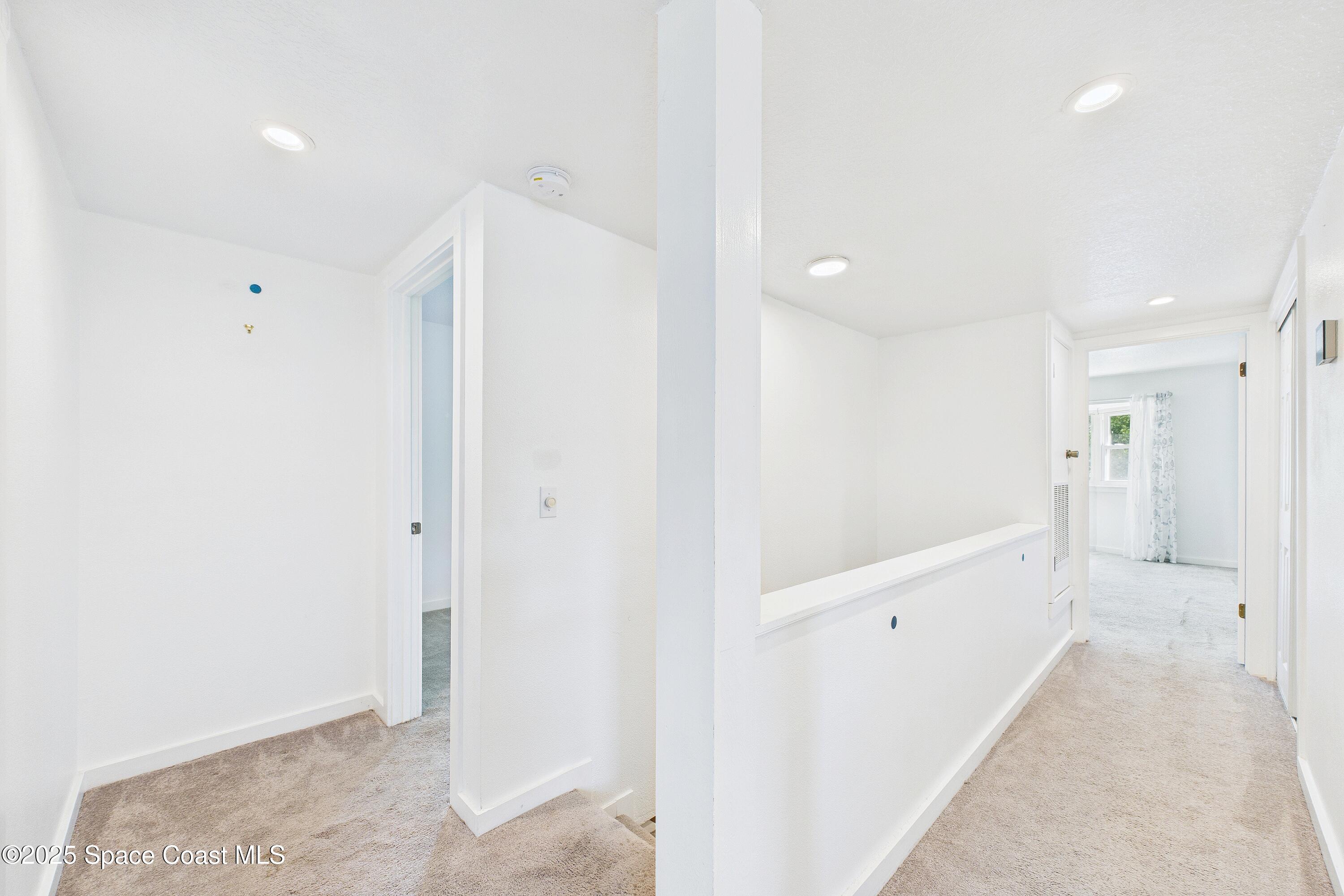 3435 Huggins Drive Malabar, FL 32950 - Photo 35 of 63 a bathroom with a bathtub and a shower