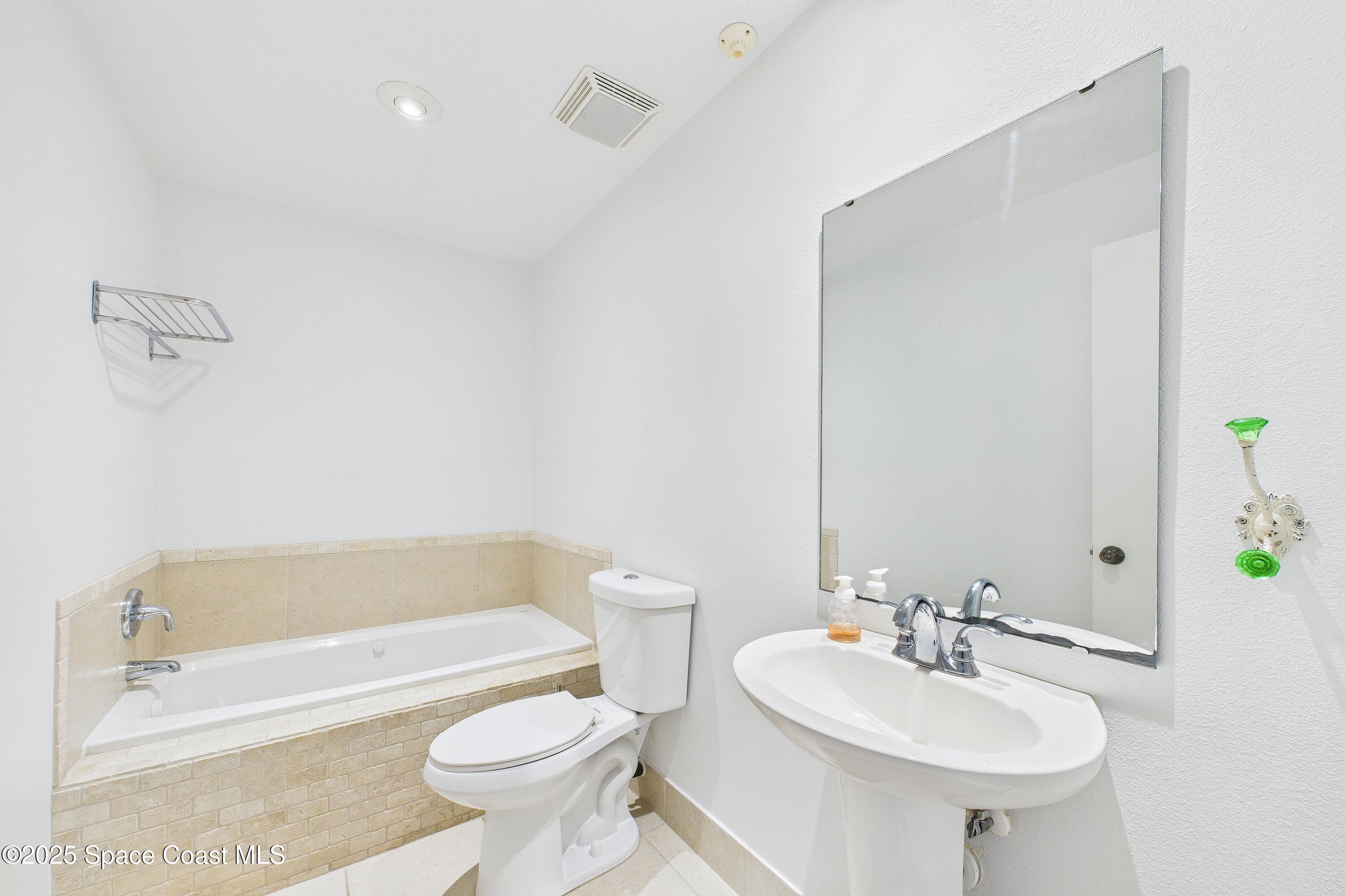 3435 Huggins Drive Malabar, FL 32950 - Photo 60 of 63 Full Guest Bath 1st Floor