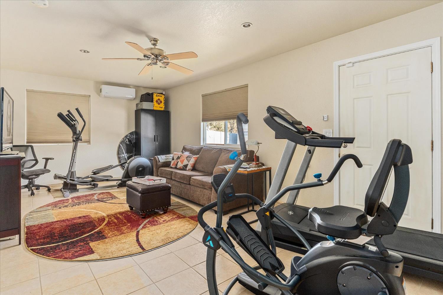 1284 Acorn Street Copperopolis, CA 95228 - Photo 25 of 62 a living room with furniture and a chandelier