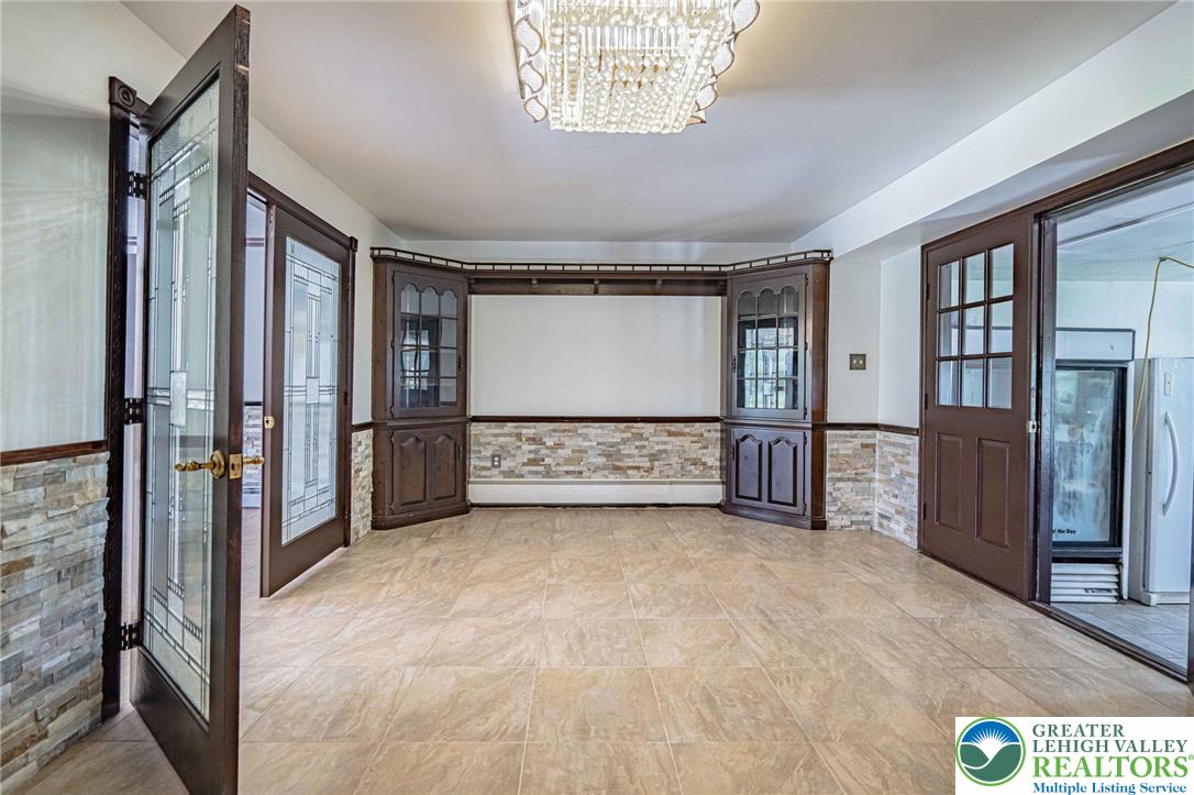 3609 Windy Road Orefield, PA 18069 - Photo 16 of 97 DINING ROOM WITYH BUILT IN CHINA CLOSETS