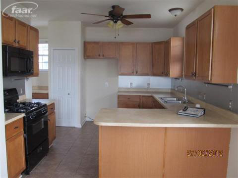 1821 Gilmore Street Howell, MI 48855 - Photo 2 of 6 20243461-1.JPG
