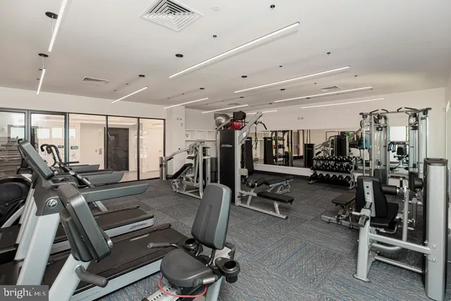 a view of a room with gym equipment