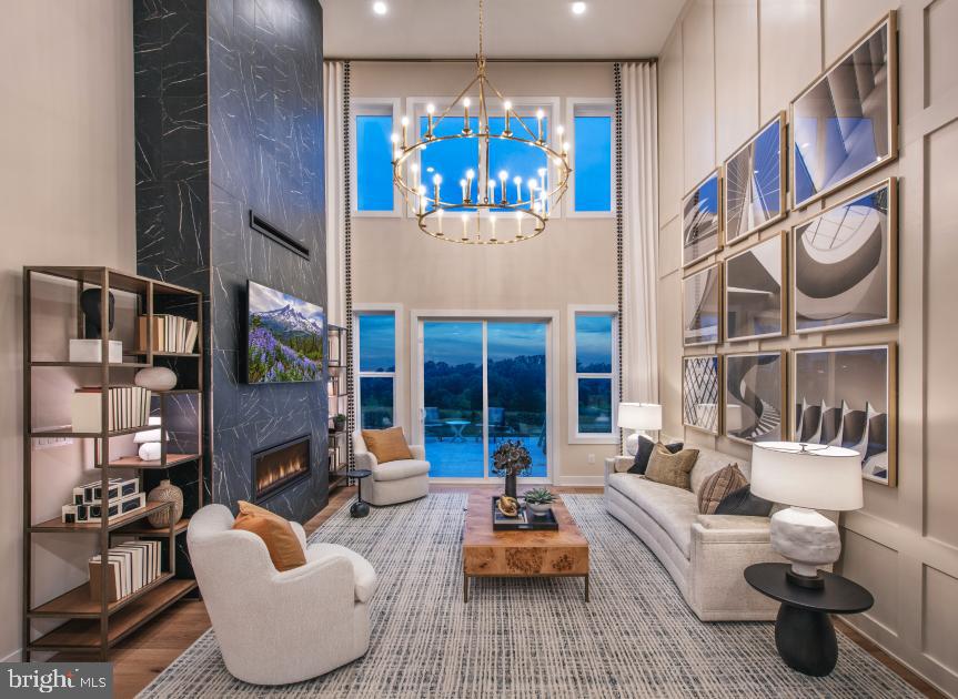 508 Trifecta Road, Unit 275 Downingtown, PA 19335 - Photo 32 of 44 a living room with fireplace furniture and a large window