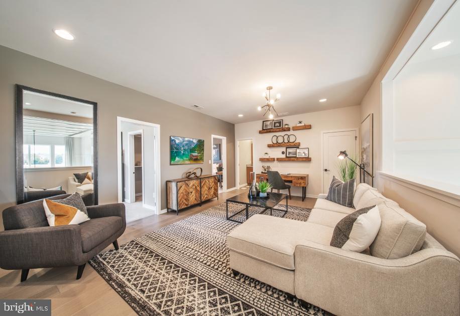 508 Trifecta Road, Unit 275 Downingtown, PA 19335 - Photo 41 of 44 a living room with furniture and a large window
