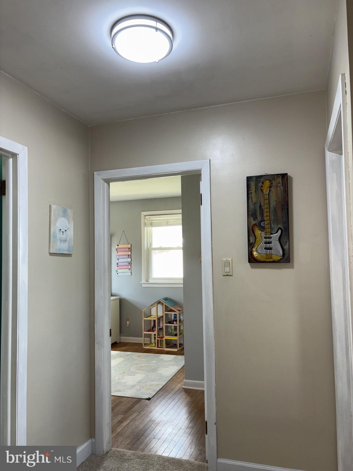 402 Grosstown Road Stowe, PA 19464 - Photo 21 of 37 Bright hallway with artistic flair.