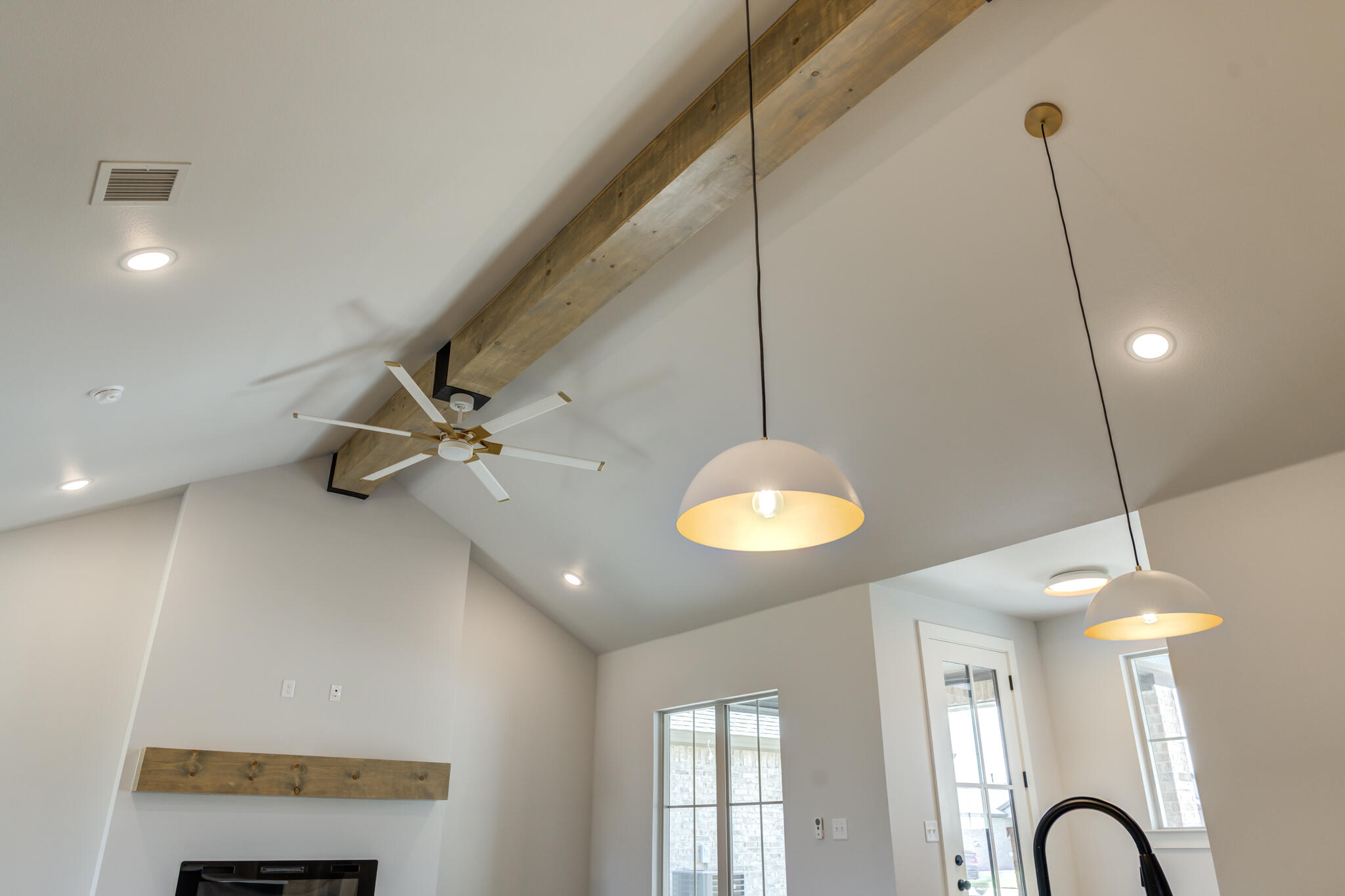 6914 13th Street Lubbock, TX 79416 - Photo 32 of 49 a view of a room with windows and ceiling fan