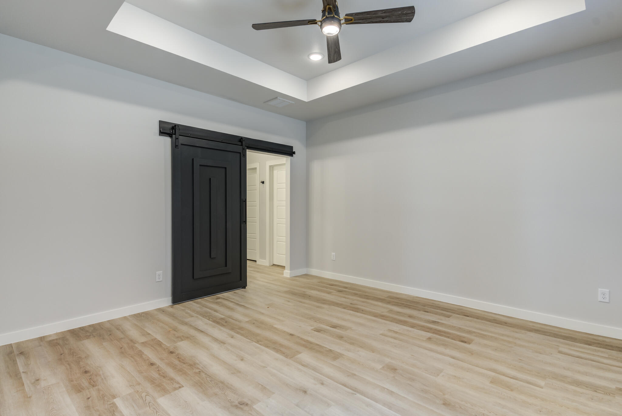 6914 13th Street Lubbock, TX 79416 - Photo 34 of 49 wooden floor in an empty room