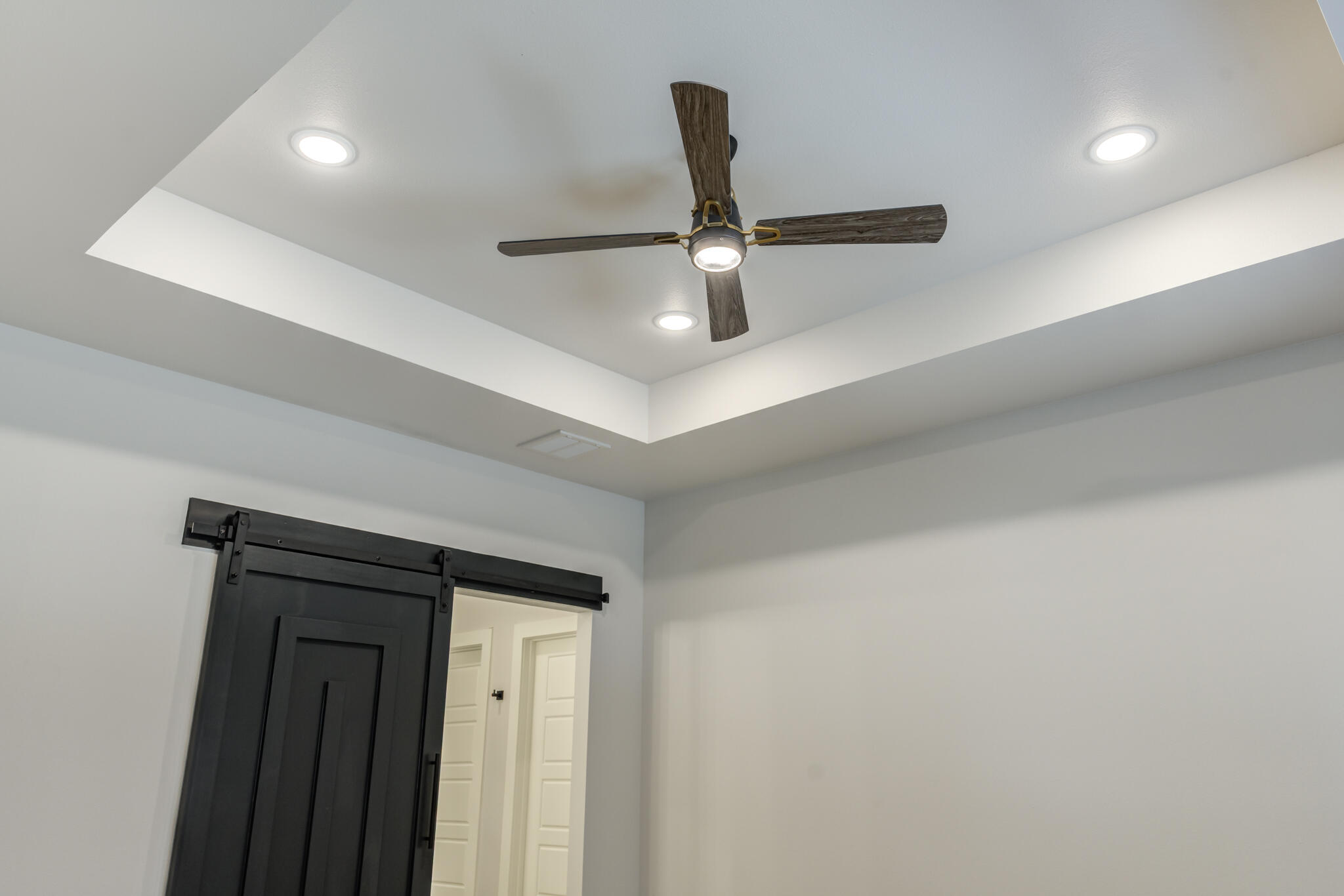 6914 13th Street Lubbock, TX 79416 - Photo 35 of 49 a hallway with a wooden floor
