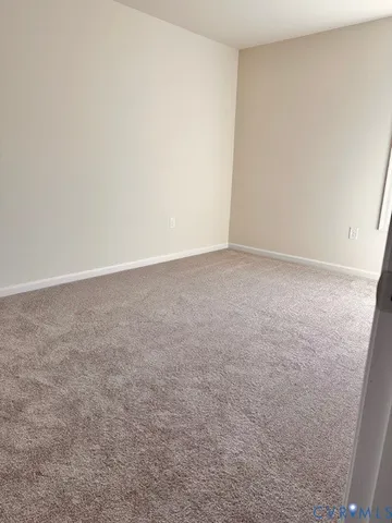 a bathroom with a sink a toilet and a shower