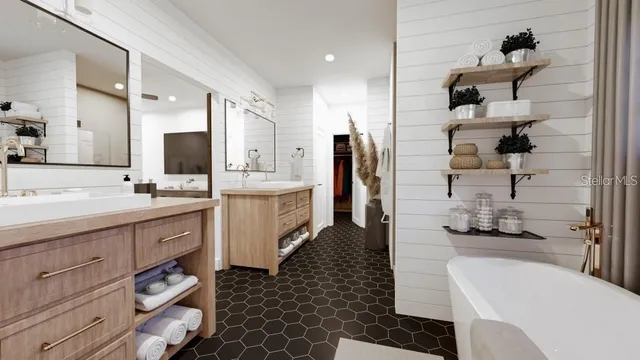 a bathroom with a double vanity sink a toilet and shower