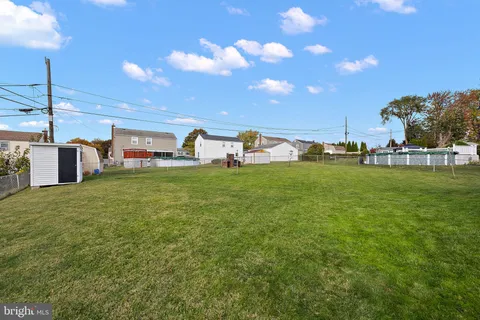 a view of a outdoor space with deck and patio