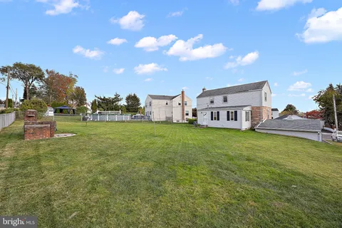 a view of a house with a big yard