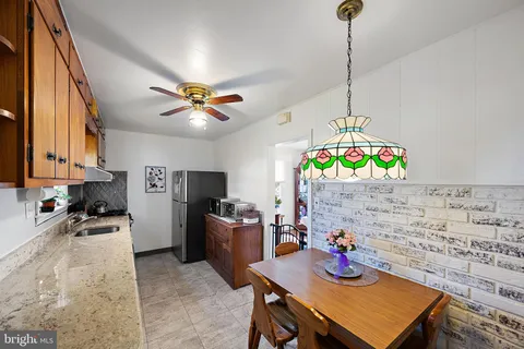 a view of a workspace with furniture