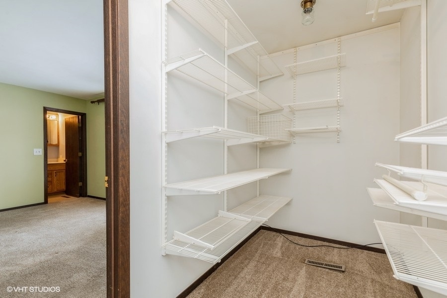 628 West Main Street Cary, IL 60013 - Photo 14 of 20 a view of an empty walk in closet