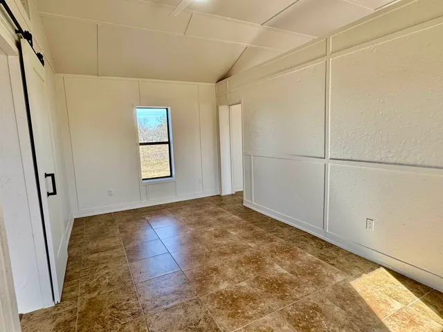 a view of a room with an empty space