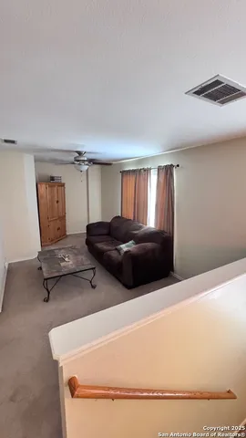 a bathroom with a sink toilet vanity and shower