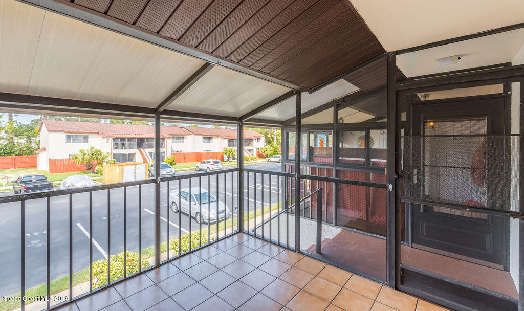 741 Ridge Club Drive, Unit 68 Melbourne, FL 32934 - Photo 15 of 21 Screened in patio
