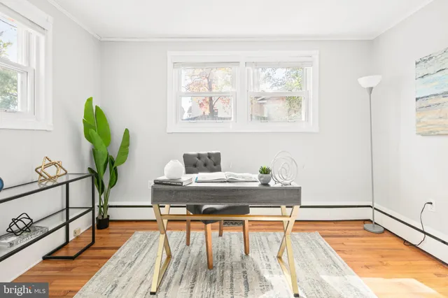 a bathroom with a sink toilet mirror and tub