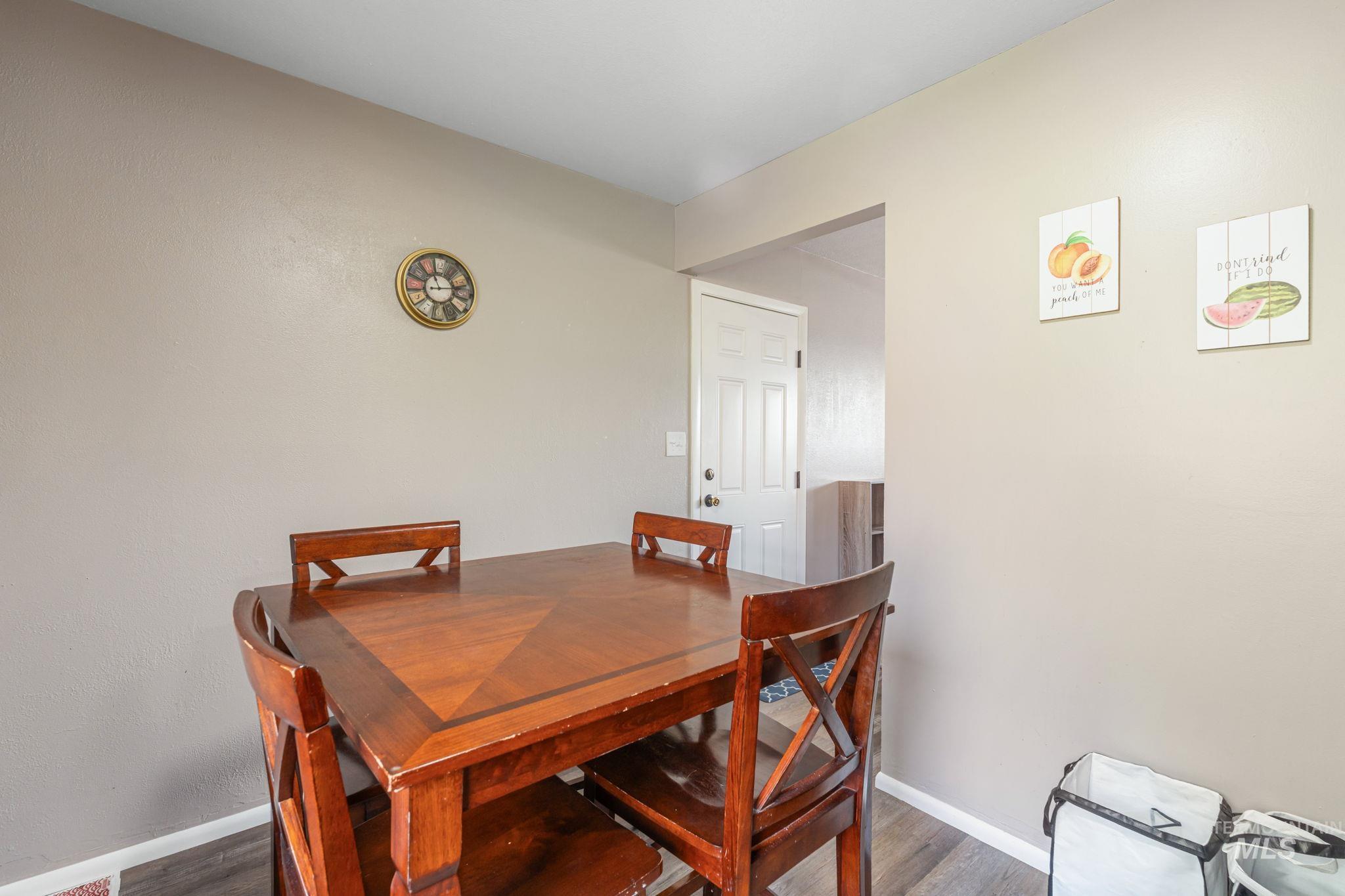 816 Park Lane Pocatello, ID 83201 - Photo 14 of 48 Dining area featuring wood finished floors and baseboards