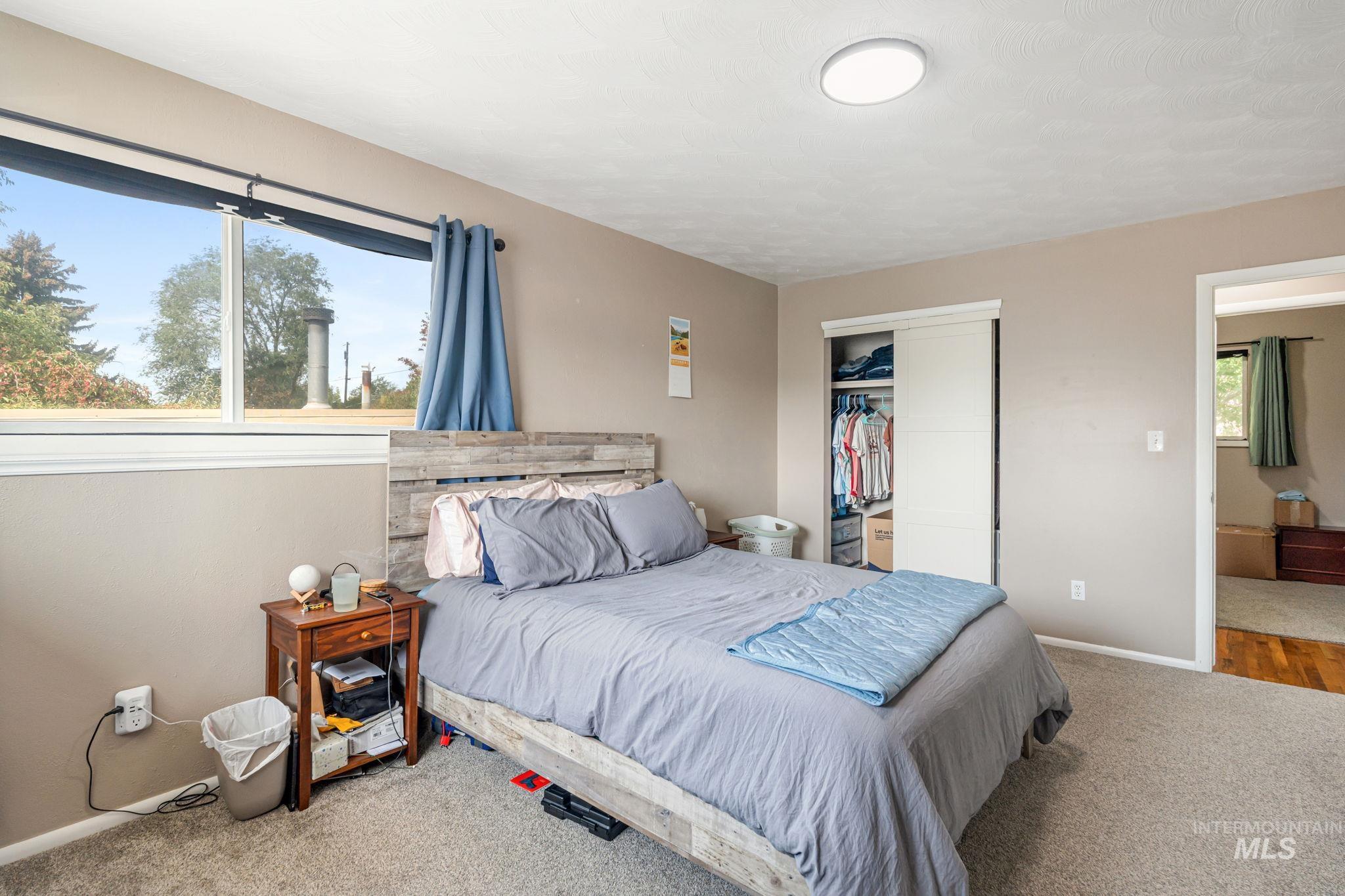 816 Park Lane Pocatello, ID 83201 - Photo 21 of 48 Bedroom featuring carpet and a closet