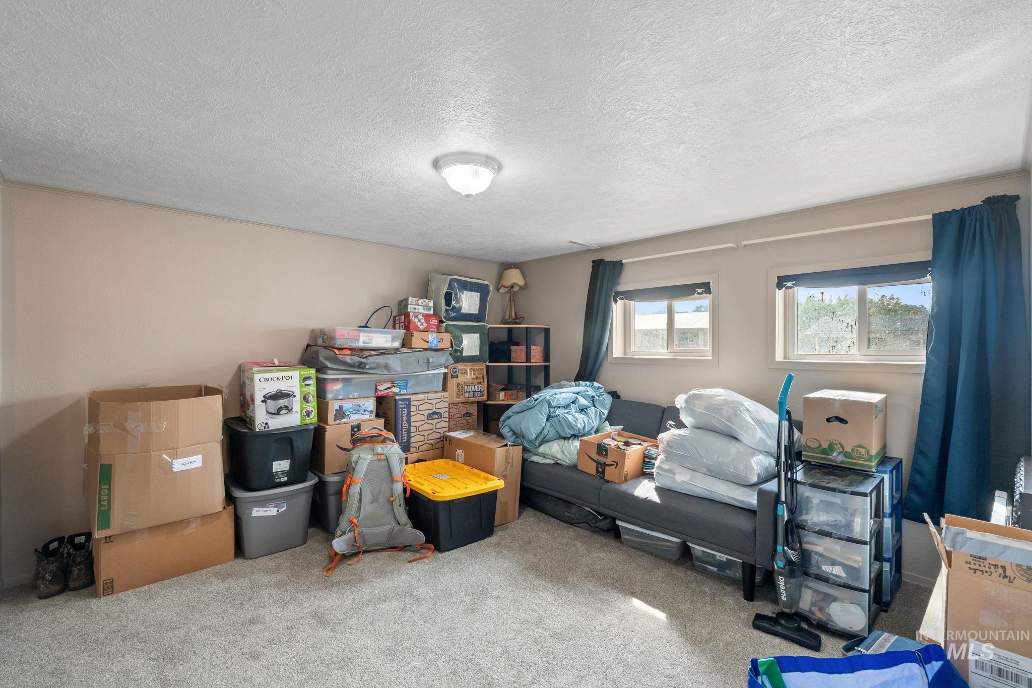 816 Park Lane Pocatello, ID 83201 - Photo 26 of 48 Bedroom featuring carpet and a textured ceiling