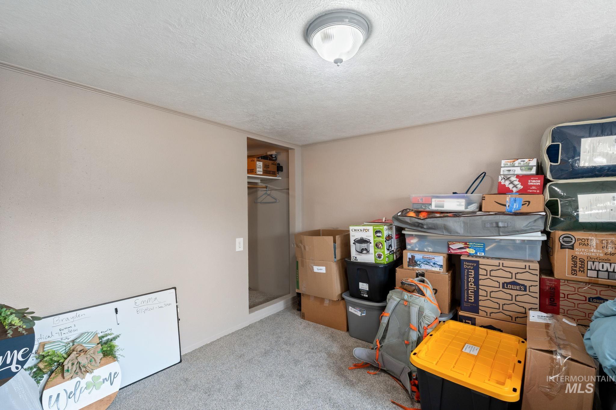 816 Park Lane Pocatello, ID 83201 - Photo 27 of 48 Office area with a textured ceiling and light carpet