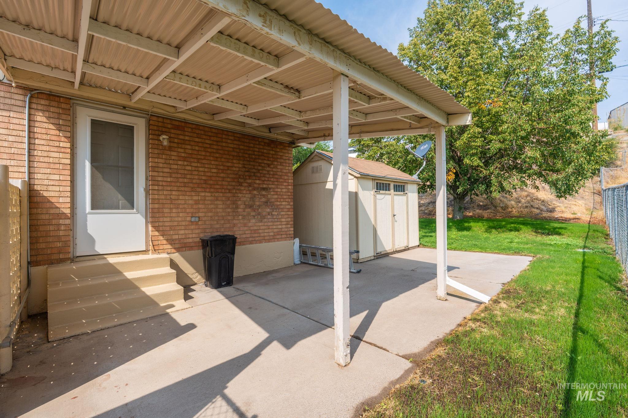 816 Park Lane Pocatello, ID 83201 - Photo 35 of 48 View of patio / terrace featuring a storage unit and entry steps
