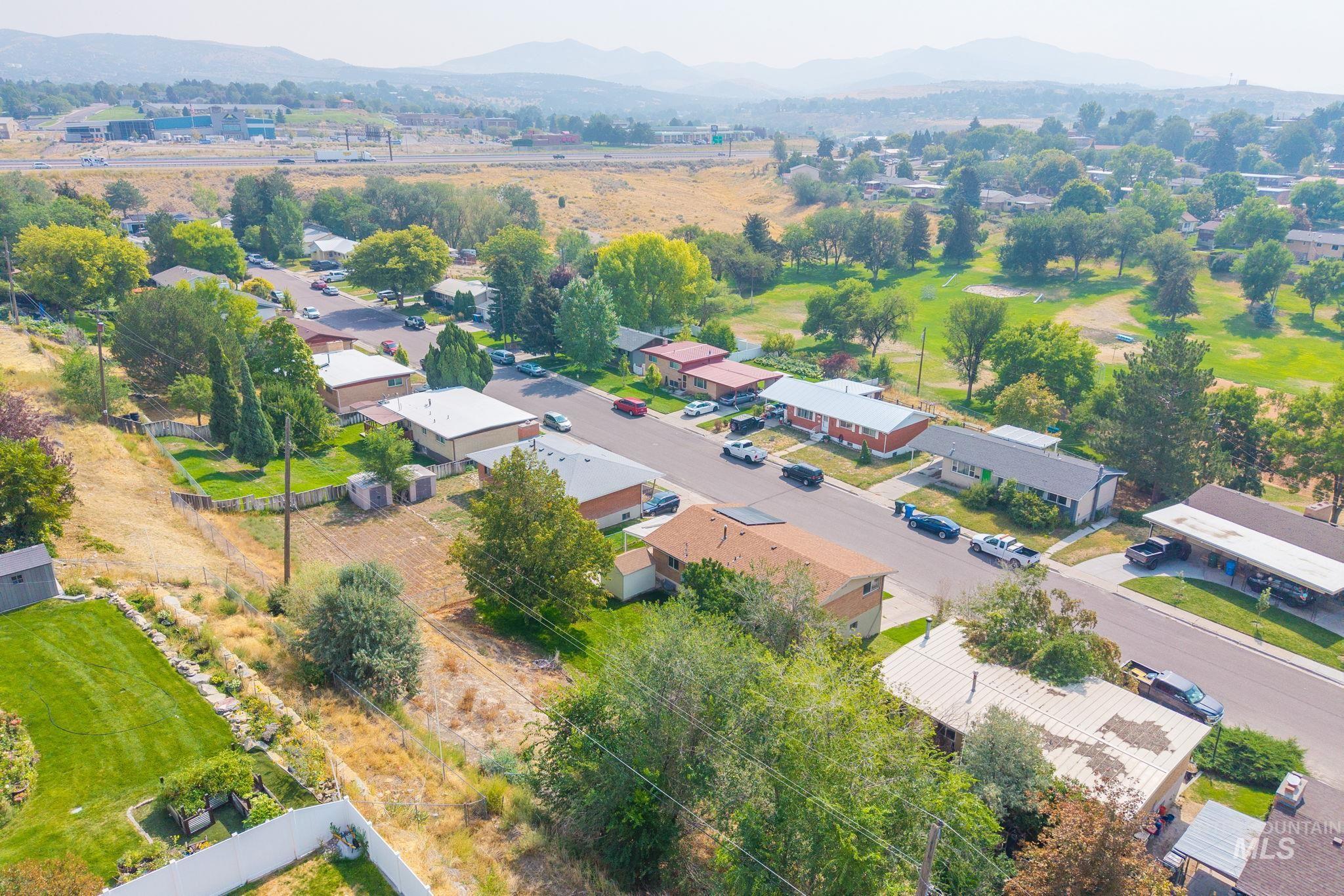 816 Park Lane Pocatello, ID 83201 - Photo 43 of 48 Aerial perspective of suburban area featuring a mountainous background
