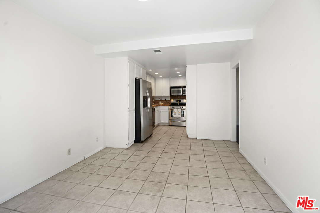 8135 Redlands Street, Unit 101 Playa del Rey, CA 90293 - Photo 14 of 42 a view of a kitchen with a sink