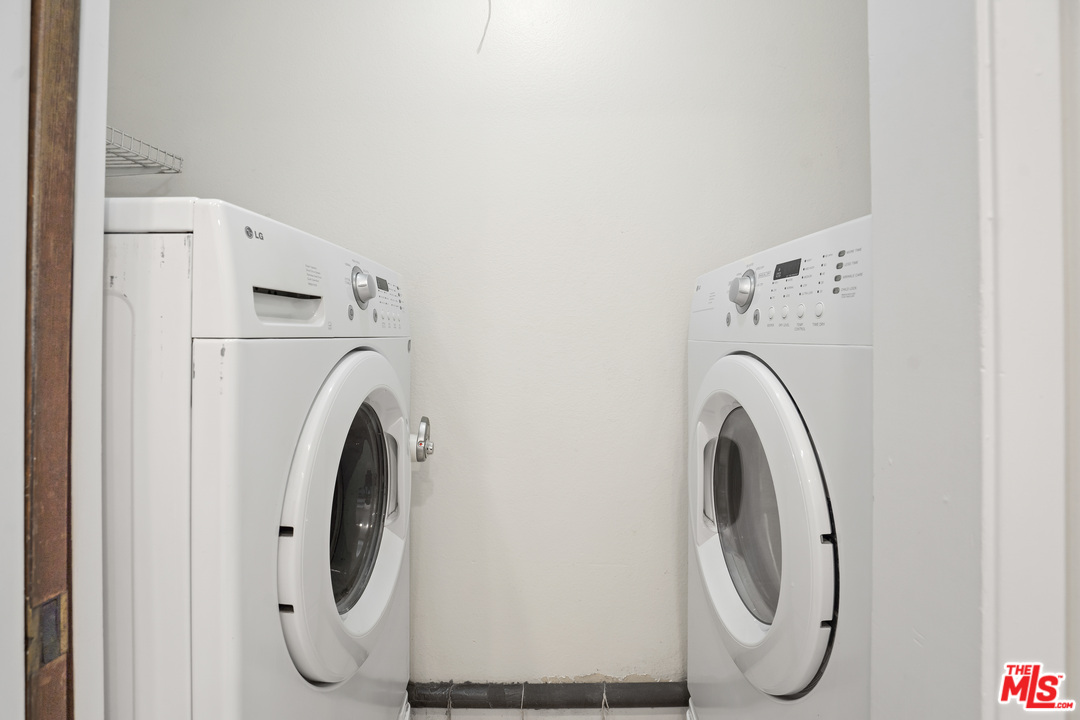 8135 Redlands Street, Unit 101 Playa del Rey, CA 90293 - Photo 20 of 42 a utility room with dryer and washer