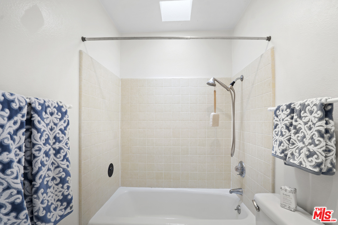 8135 Redlands Street, Unit 101 Playa del Rey, CA 90293 - Photo 36 of 42 a bathroom with a bathtub and shower