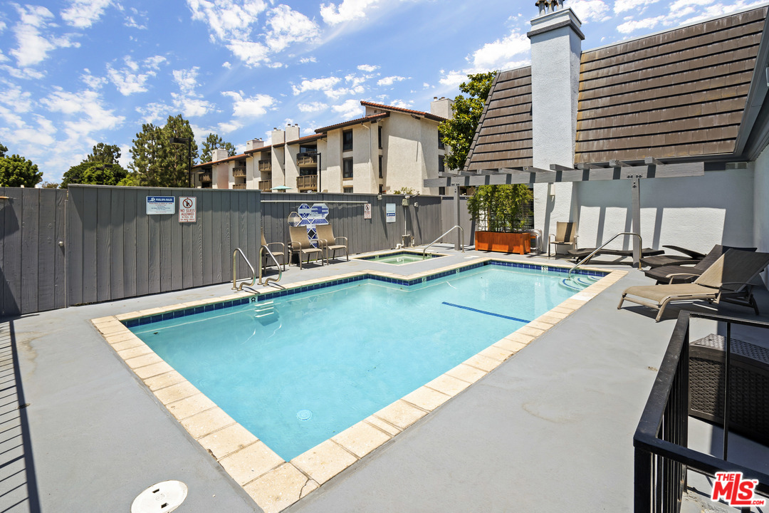8135 Redlands Street, Unit 101 Playa del Rey, CA 90293 - Photo 39 of 42 a view of a patio with swimming pool