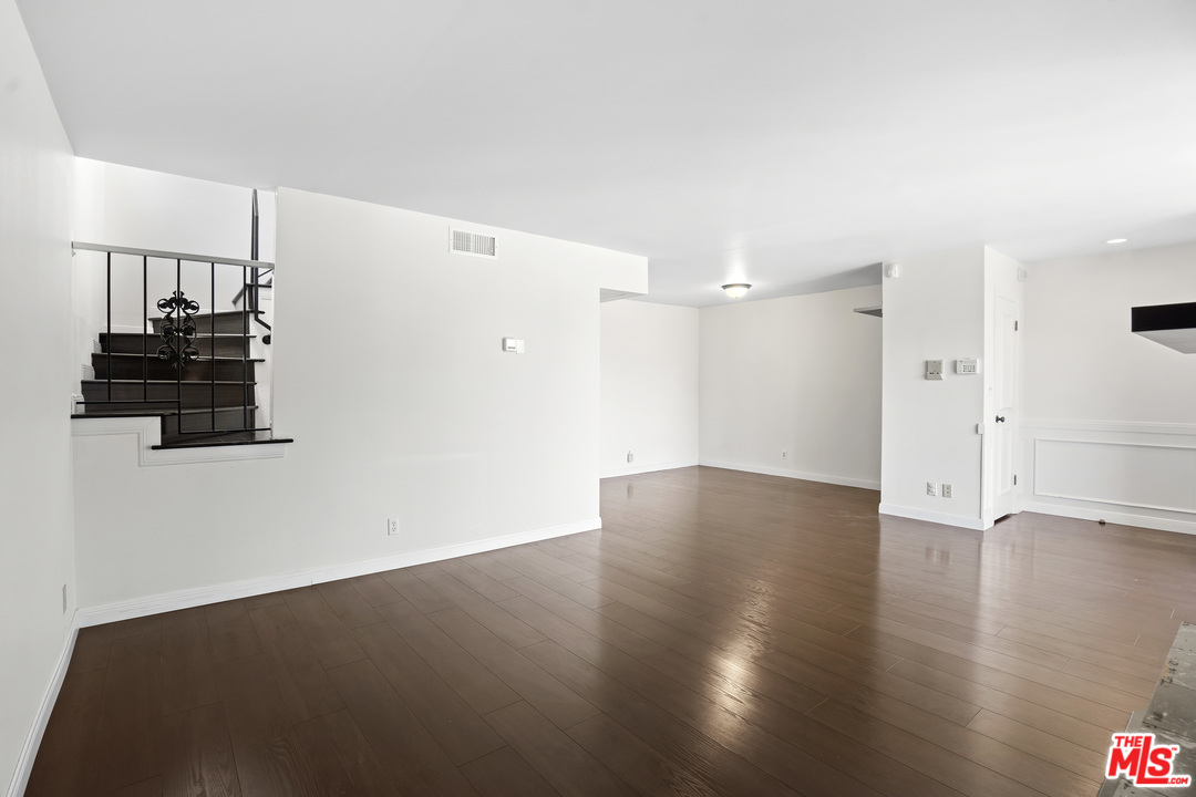 8135 Redlands Street, Unit 101 Playa del Rey, CA 90293 - Photo 9 of 42 a view of a livingroom with wooden floor