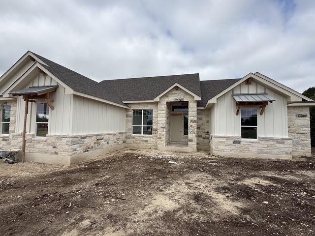 127 Riparian Elm Road Bertram, TX 78605 - Photo 8 of 25 front view of a house with a yard
