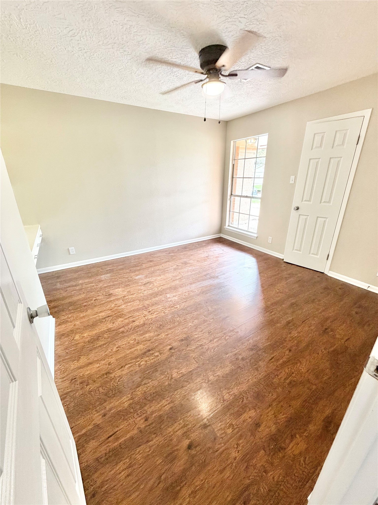 98 Sparrow Way Beaumont, TX 77707 - Photo 11 of 25 a view of an empty room with a window