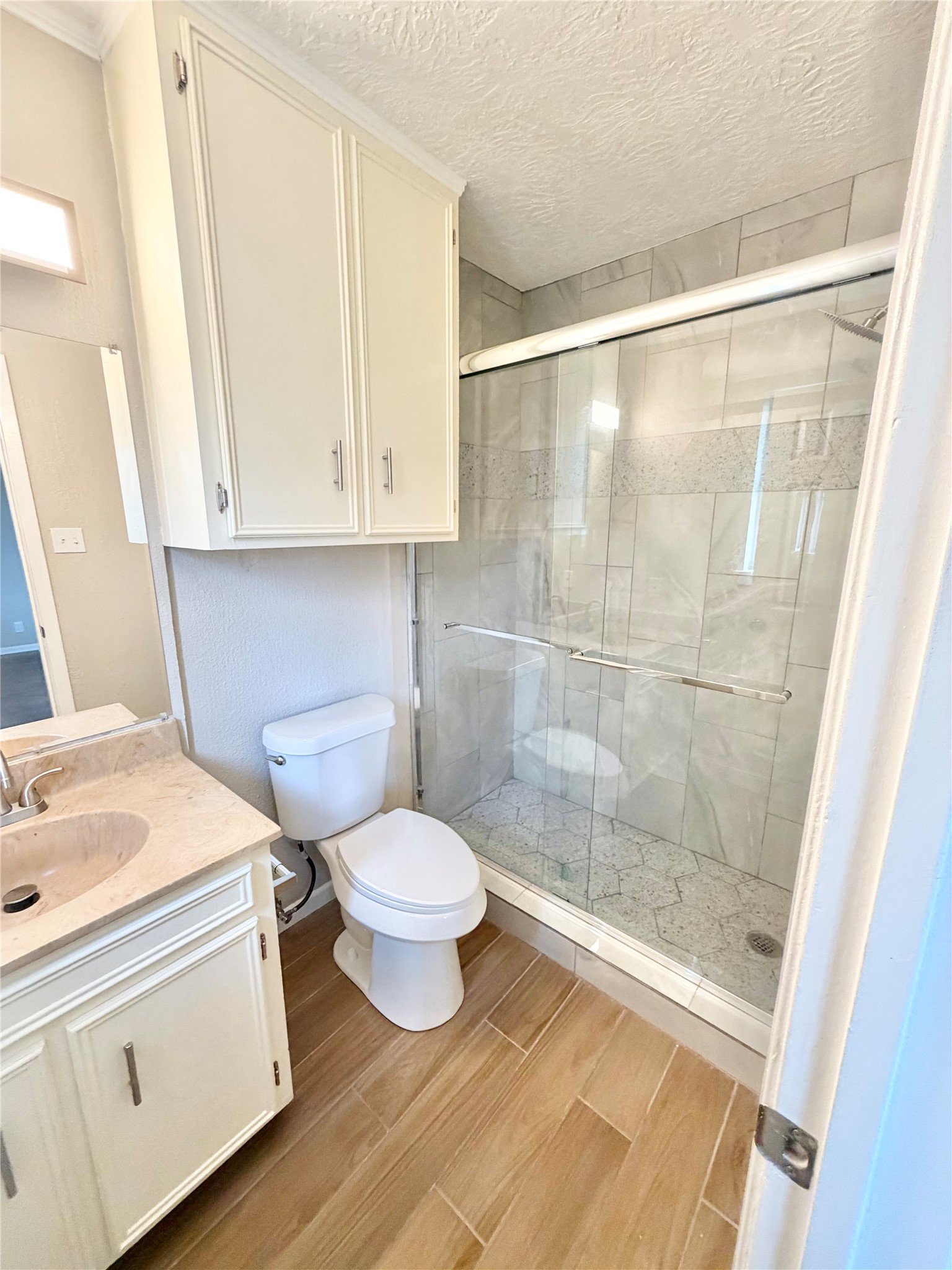 98 Sparrow Way Beaumont, TX 77707 - Photo 13 of 25 a bathroom with a sink toilet and shower