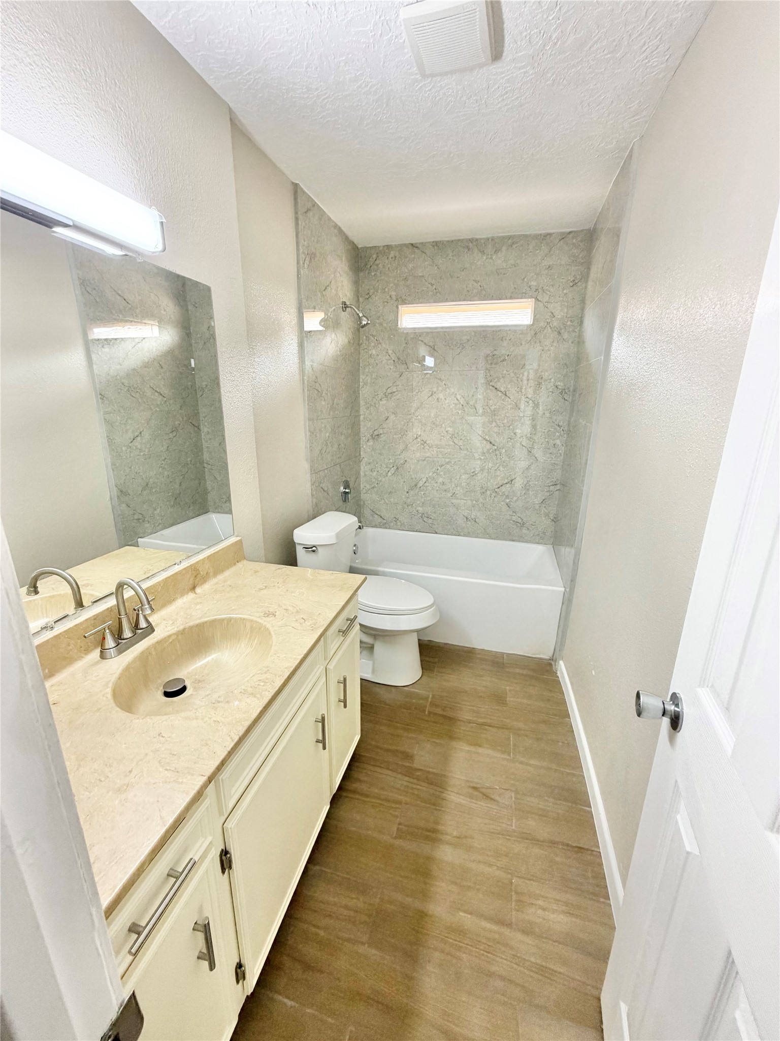 98 Sparrow Way Beaumont, TX 77707 - Photo 15 of 25 a bathroom with a double vanity sink toilet and shower