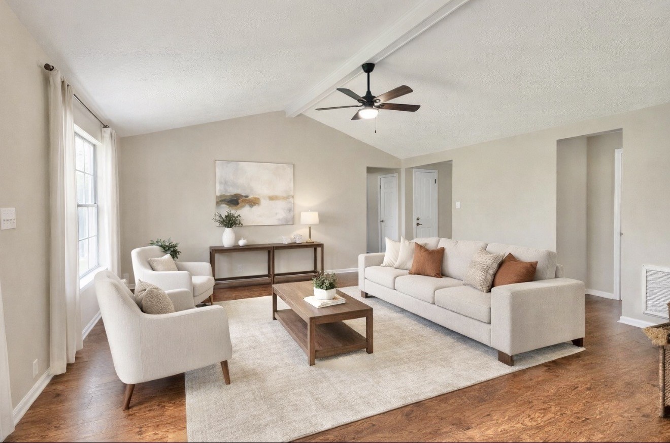 98 Sparrow Way Beaumont, TX 77707 - Photo 4 of 25 a living room with furniture and a large window